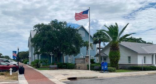a house with an american flag on top of it at 208 Gunter in Saint Marys