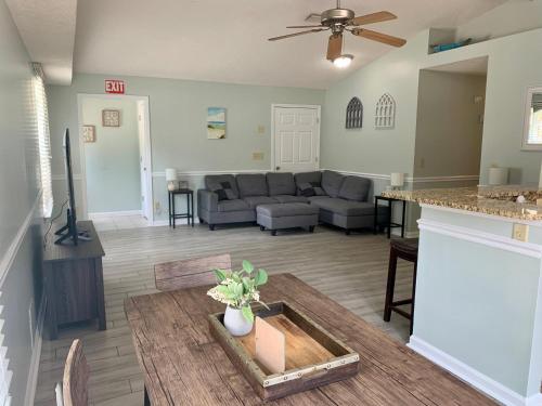 a living room with a couch and a table at 208 Gunter in Saint Marys