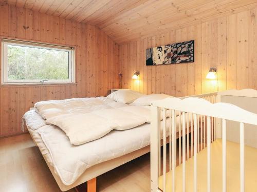 Ένα ή περισσότερα κρεβάτια σε δωμάτιο στο 4 star holiday home in Idestrup