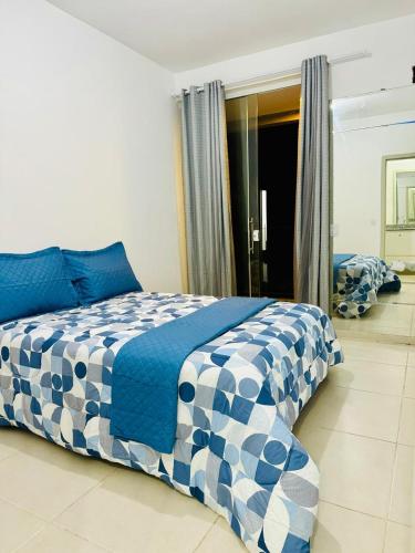 Una cama o camas en una habitación de Casa brisa do mar