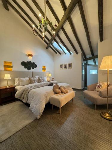 Letto o letti in una camera di Santa Lucía Casa Hotel