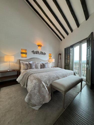 Letto o letti in una camera di Santa Lucía Casa Hotel
