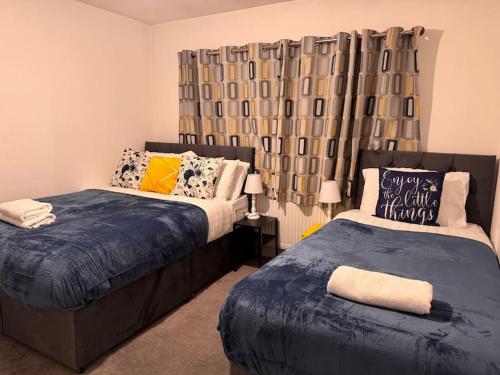 Ένα ή περισσότερα κρεβάτια σε δωμάτιο στο 3 Bedroom Spacious Bella Range Homes