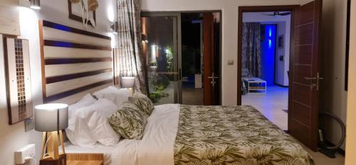 Ένα ή περισσότερα κρεβάτια σε δωμάτιο στο LA VILLA 1 Deluxe3 Mont Choisy MAURITIUS