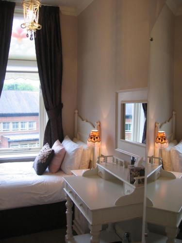 Katil atau katil-katil dalam bilik di Shelbourne House
