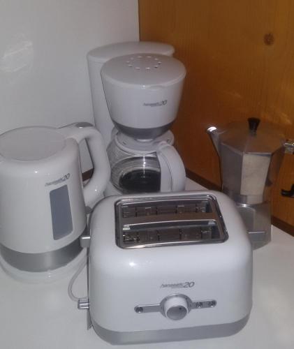 a white blender sitting on top of a counter at Residence Silvester in Racines
