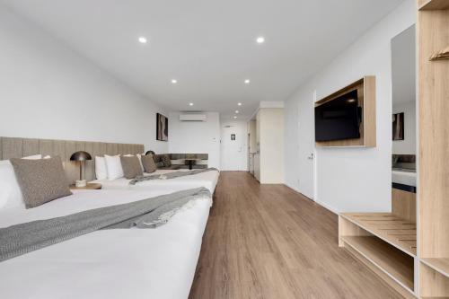 Rambla at Story Houseにあるテレビまたはエンターテインメントセンター