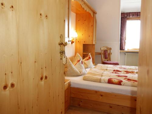 Postel nebo postele na pokoji v ubytování Schwarzwaldgasthof Hotel Schwanen