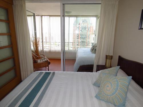 Ліжко або ліжка в номері Alto Coraceros Apartment
