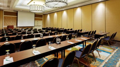 a large room with tables and chairs in it at Holiday Inn San Antonio-Riverwalk by IHG in San Antonio