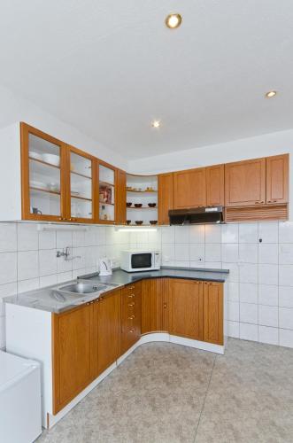 Kuchyň nebo kuchyňský kout v ubytování Hotel Slavia