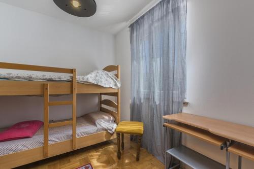 Postel nebo postele na pokoji v ubytování Apartment Nena