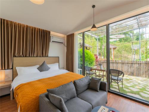 Katil atau katil-katil dalam bilik di Xiamen Wujing Mountain and Sea View Hotel