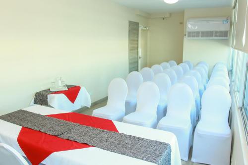 Postel nebo postele na pokoji v ubytování Hotel Bahía Suites