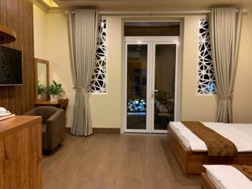 Ένα ή περισσότερα κρεβάτια σε δωμάτιο στο 10h Hotel