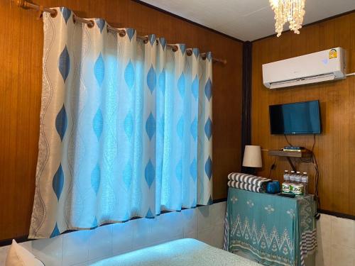 Ένα ή περισσότερα κρεβάτια σε δωμάτιο στο Small Guest House Koh Kood