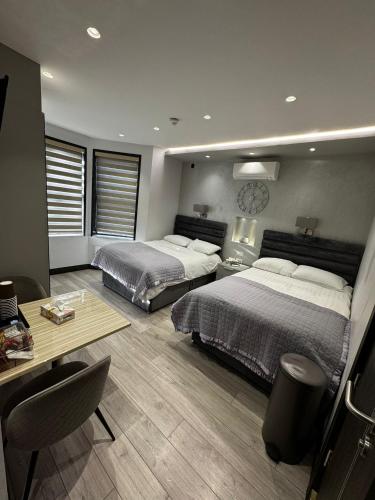 Postel nebo postele na pokoji v ubytování Park Avenue Hotel