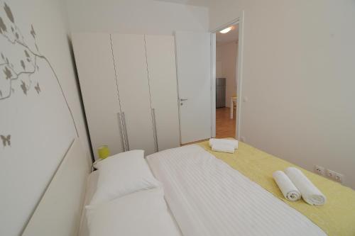 Posteľ alebo postele v izbe v ubytovaní Amaros Apartment