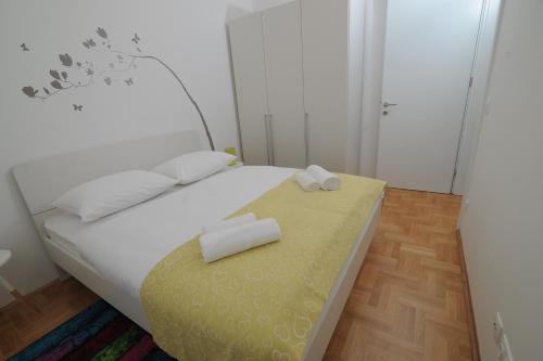 Posteľ alebo postele v izbe v ubytovaní Amaros Apartment
