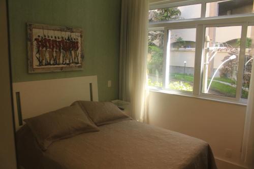 Ένα ή περισσότερα κρεβάτια σε δωμάτιο στο Apartamento Design Alto Leblon