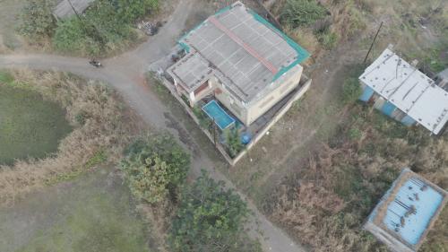 an aerial view of a house with a roof at Palmquist Villa in Neral