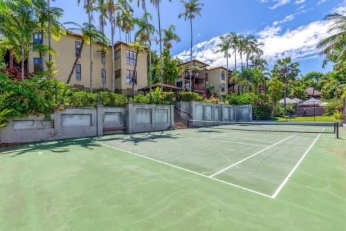 an image of a tennis court with palm trees at The Point Villa 10 in Port Douglas