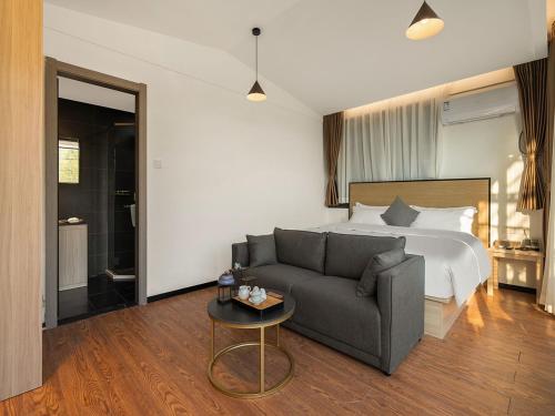 Katil atau katil-katil dalam bilik di Xiamen Wujing Mountain and Sea View Hotel