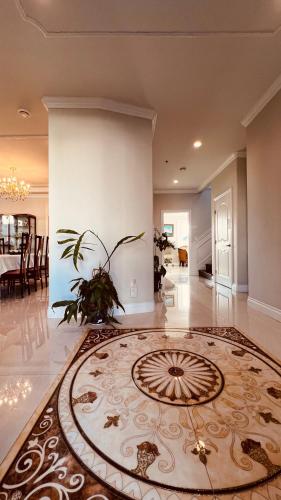 a large living room with a rug on the floor at Coze home in Vancouver near YVR in Vancouver