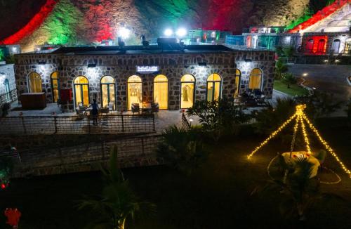 a model of a building with christmas lights at Dibba Mountain Park Resort in Fujairah