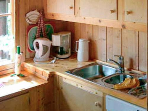 a kitchen with a sink and a counter top at 6 person holiday home in NESBYEN-By Traum in Nesbyen