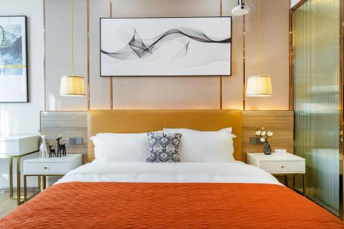 Yunmu International Hotel Chongqing Jiefangbei Pedestrian Street Branchにあるベッド