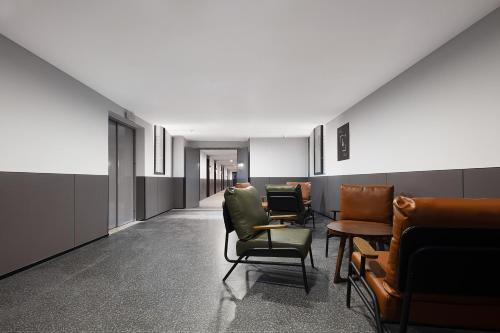 Mcsrh Hotel-Chengdu Jianshe Roadにあるシーティングエリア