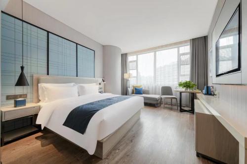 Imagen de la galería de Echarm Hotel Wuhan High Speed Railway Jianji Road Metro Exit, en Wuhan