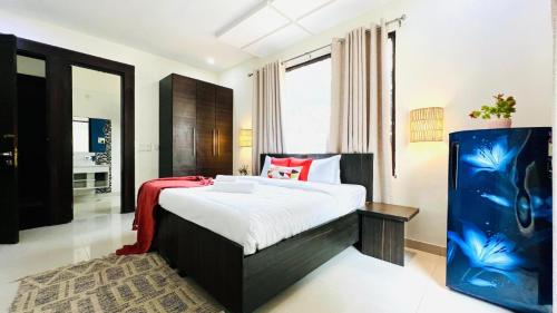 Katil atau katil-katil dalam bilik di BluO Stays - DLF CyberCity Gurgaon
