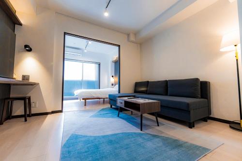 Χώρος καθιστικού στο Apartment Hotel MODISH Gion