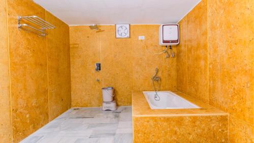 a bathroom with a sink and a toilet at Marubhumi Luxury Resort in Sām
