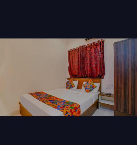 Ένα ή περισσότερα κρεβάτια σε δωμάτιο στο THE UNITED HOTEL
