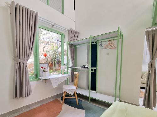Postel nebo postele na pokoji v ubytování Anh Quân House