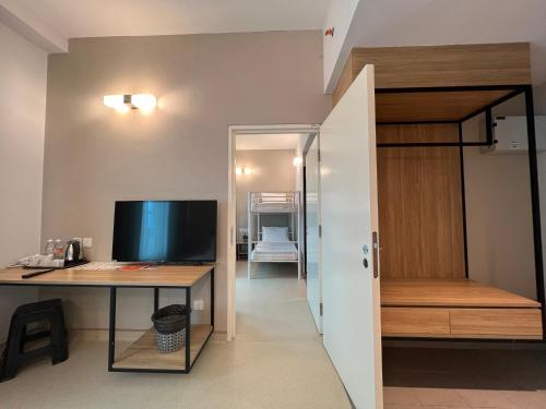 TV a/nebo společenská místnost v ubytování Serapi Verdure Hotel