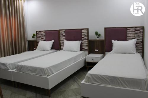 Hotel al rayanにあるベッド