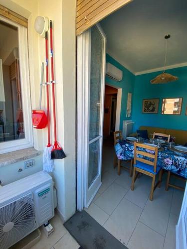 a room with a table and a dining room at Florentia Viola Apartament I in Florence