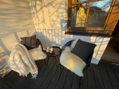 an overhead view of two pillows on a deck at Ferienwohnungen Lukaserhof in Mieming