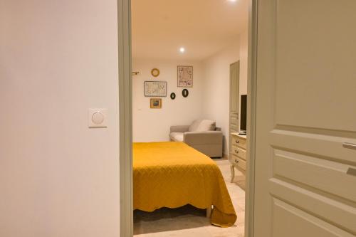 Postel nebo postele na pokoji v ubytování Les Longères de Montfranc - Chambres d'hôtes