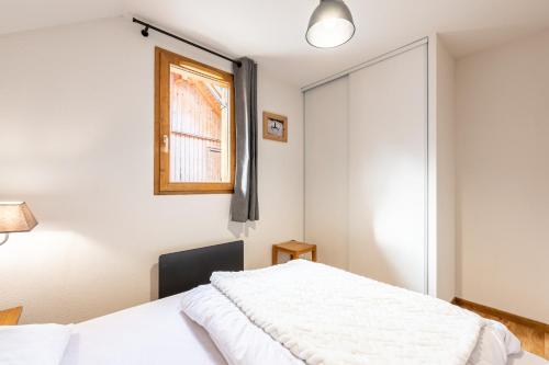 Ένα ή περισσότερα κρεβάτια σε δωμάτιο στο Appartement Atlas