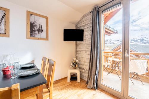 Μια τηλεόραση ή/και κέντρο ψυχαγωγίας στο Appartement Atlas