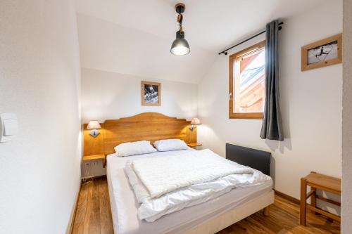 Ένα ή περισσότερα κρεβάτια σε δωμάτιο στο Appartement Atlas