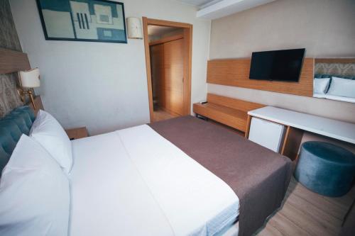 Katil atau katil-katil dalam bilik di Royal Mersin Otel