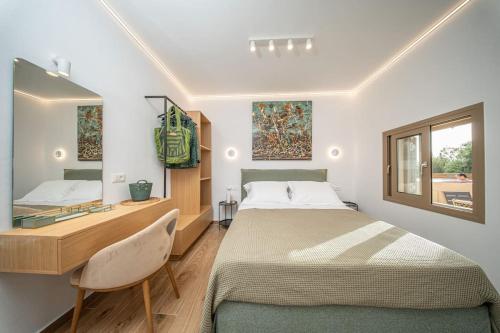 Postel nebo postele na pokoji v ubytování Tzortzatos Tiny Home