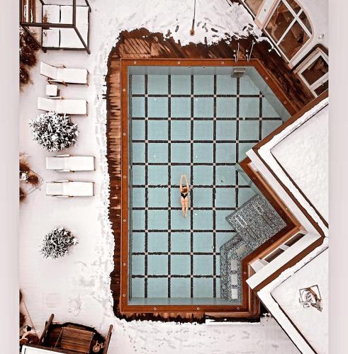 an overhead view of a door in the snow at Superior Sport und Familienresort Alpenblick in Zell am See