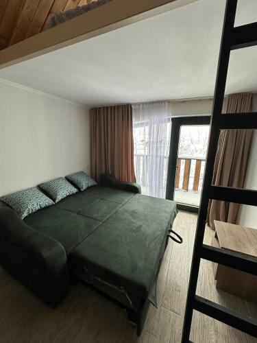 Postel nebo postele na pokoji v ubytování Mount Cottages Bakuriani